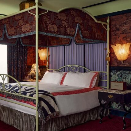 Custom wall sconce fixtures installed in a guest room at The Lafayette